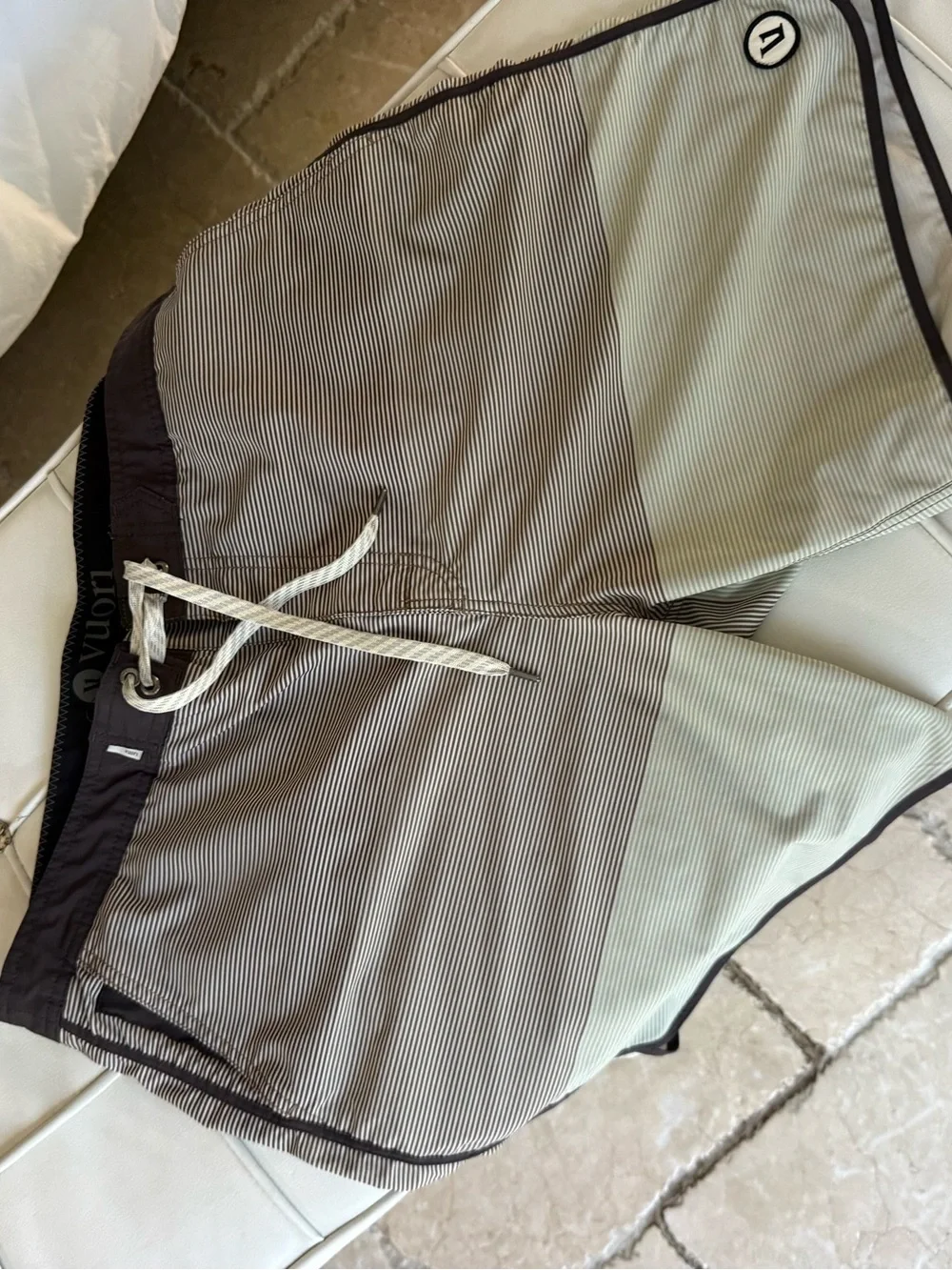 Vuori Men's Pinstripe Swim Board Shorts in Light Gray and Brown Trim